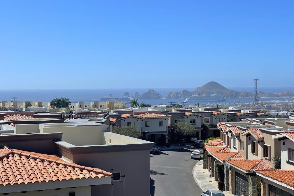 Los Cabos Cumbre Del Tezal Move-in ready and fully furnished. 2,045 sq ft of construction on a 2,551 sq ft lot with 3-car parking. Luxury finishes include marble flooring, wood kitchen with granite countertops, built-in wooden closets in all bedrooms, and vanities with tempered glass shower doors in all 3.5 baths. Fully equipped with 5 Gree inverter mini-split A/C units (3 ร 1-ton, 2 ร 2-ton), LG 22' French Door refrigerator, Whirlpool gas stove, and 1.7 cu ft microwave hood. Additional features: rooftop with bar, grill & sink, private terrace, storage, WiFi smart lock, private 5,000-liter cistern, and termite prevention system. ommunity: pool, gym, sports courts, kids' area, 3 clubhouses & 24/7 gated security for sale