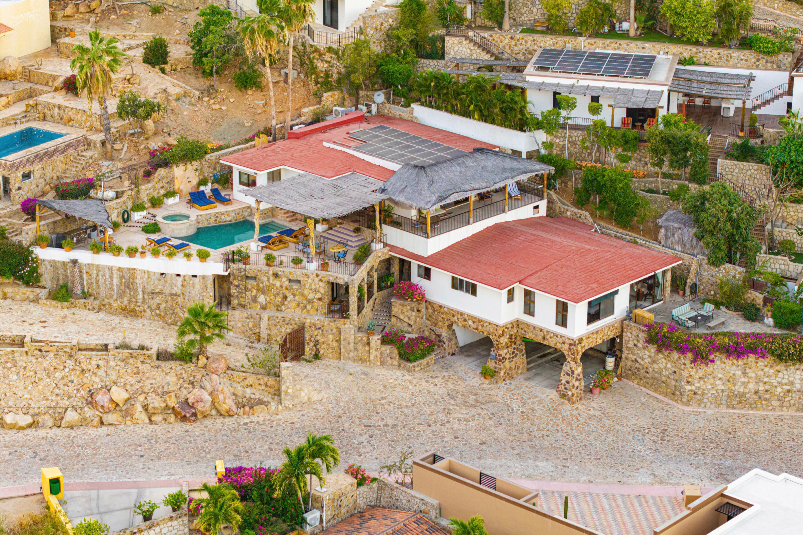 Los Cabos Pedregal Csl Villa Felicidad is a 5-bedroom, 5.5-bath residence in Pedregal that combines scale, location, and proven income potential. Set just minutes from the main gate and within walking distance to the marina, it offers effortless access to Cabo's best dining and nightlife while maintaining privacy. The home features a private pool, expansive terraces, and panoramic marina – 104 Los Valles, San Jose del Cabo, BS