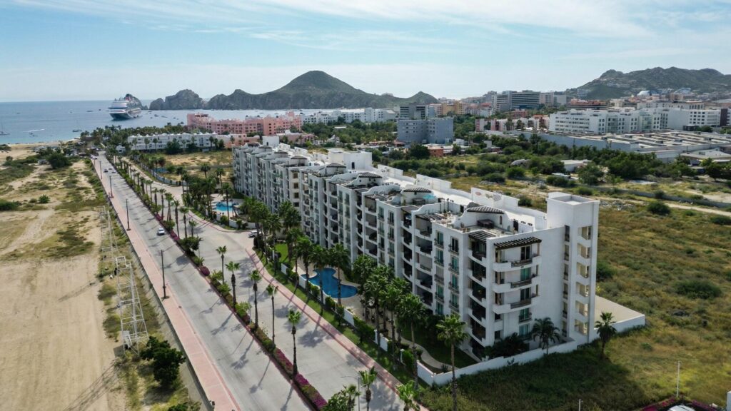 Los Cabos Vista Vela Iii Exceptional opportunity to own a turnkey, beautifully furnished 3-bedroom, 3-bathroom ground-floor condo in the highly sought-after Vista Vela development. This bright, open-concept condo features a spacious living area adorned custom built-ins, seamlessly transitioning into a fully accessorized kitchen complete with a breakfast bar--perfect for entertaining. The generously sized bedrooms boasts private ensuite bath, offering ultimate comfort and privacy for guests. Step out onto your private terrace to enjoy direct, seamless access to the sparkling resort-style pool. Unmatched in convenience and walkability, this prime location places you steps from popular local restaurants, trendy coffee shops, and grocery stores, while remaining just minutes from the beach, vibrant downtown, & marina. Situated within the premier Vista Vela community, this property offers a family and pet-friendly environment enveloped in lush landscaping and protected by 24-hour onsite security with secured access. Residents enjoy resort-style amenities including 3 pristine pools, a fully equipped gym, pickleball courts, a children's play area, dedicated barbecue areas, a cozy firepit, and an expansive community space perfect for hosting larger gatherings. Whether you are seeking a lucrative short-term or long-term rental property with incredible income potential or a turnkey dream home ready for immediate move-in, this rare ground-floor oasis delivers the ultimate Cabo lifestyle.Oportunidad excepcional para adquirir un condominio llave en mano, bellamente amueblado, de 3 recámaras y 3 baños en planta baja en el codiciado complejo Vista Vela. Este luminoso condominio de concepto abierto cuenta con una espaciosa sala de estar con muebles empotrados a medida, que se integra a la perfección con una cocina totalmente equipada con barra de desayuno, ideal para recibir invitados. Las recámaras, de generosas dimensiones, cuentan con baño privado, ofreciendo máxima comodidad y privacidad para los huéspedes. Salga a su terraza privada y disfrute de acceso directo a la espectacular piscina estilo resort. Con una ubicación privilegiada que le brinda una comodidad inigualable y fácil acceso a pie, se encuentra a pocos pasos de populares restaurantes locales, cafeterías de moda y supermercados, a solo minutos de la playa, el vibrante centro de la ciudad y el puerto deportivo. Ubicada en la exclusiva comunidad de Vista Vela, esta propiedad ofrece un ambiente familiar y acogedor para mascotas, rodeado de exuberantes jardines y con seguridad las 24 horas y acceso controlado. Los residentes disfrutan de comodidades estilo resort, que incluyen 3 piscinas impecables, un gimnasio totalmente equipado, canchas de pickleball, un área de juegos para niños, zonas de barbacoa, una acogedora fogata y un amplio espacio comunitario ideal para celebrar grandes reuniones. Ya sea que busque una propiedad de alquiler rentable a corto o largo plazo con un increíble potencial de ingresos o... – Vista Vela III, Cabo Corridor, BS